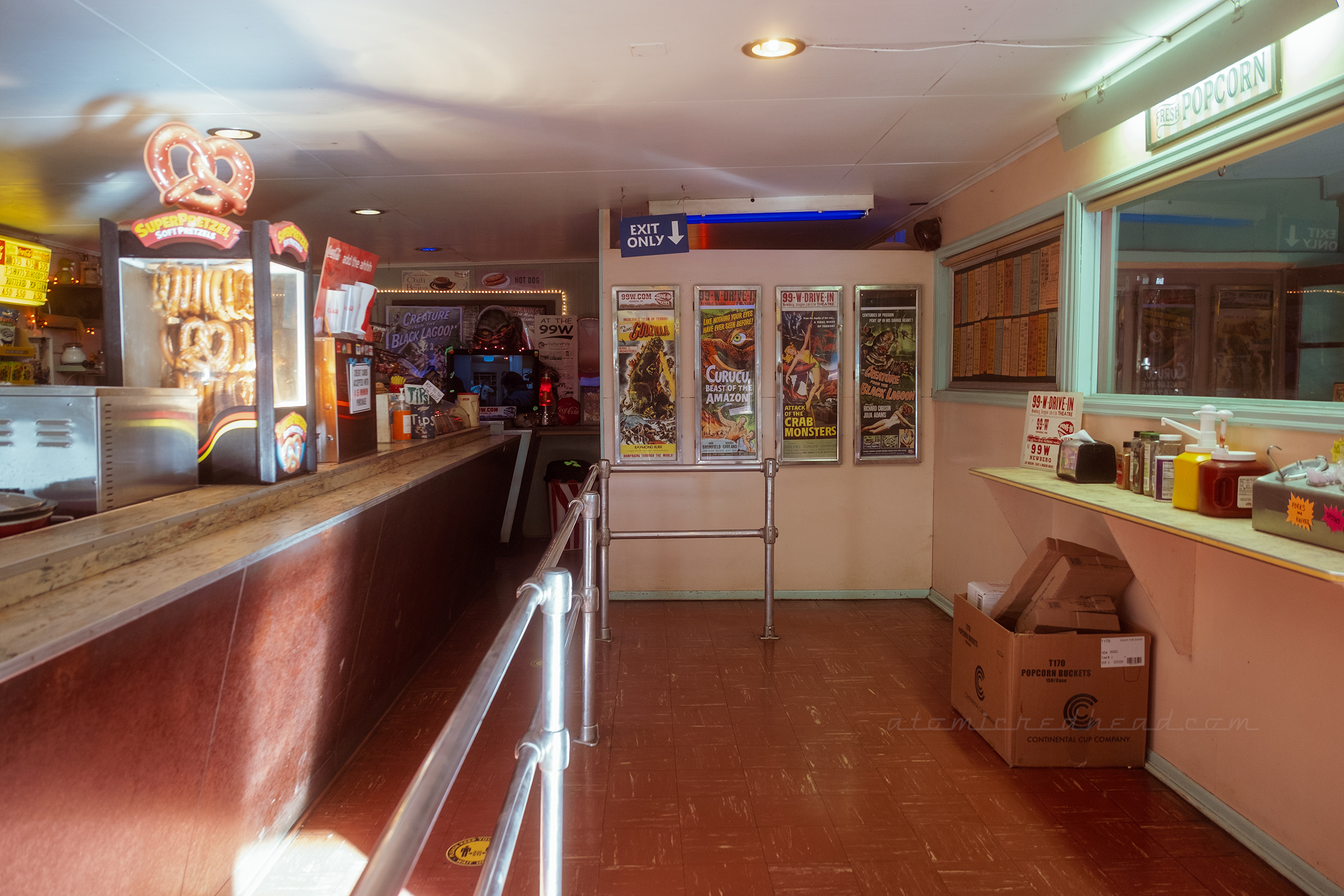 Interior of the concession stand, filled with vintage posters.