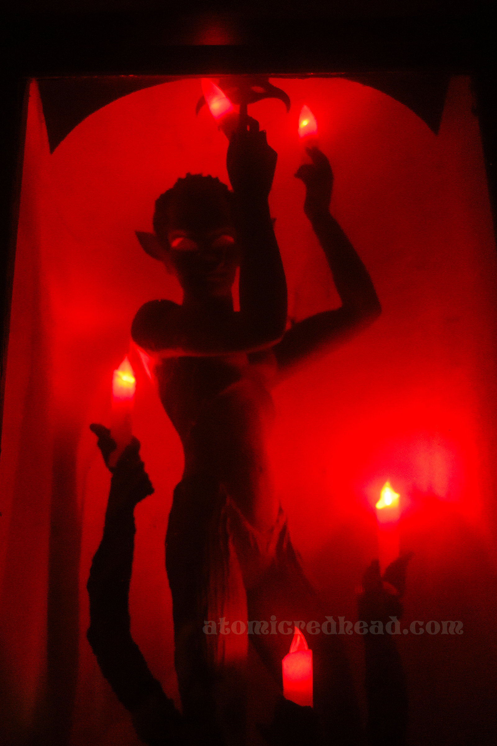 A demonic looking light fixture inside the Haunted House.