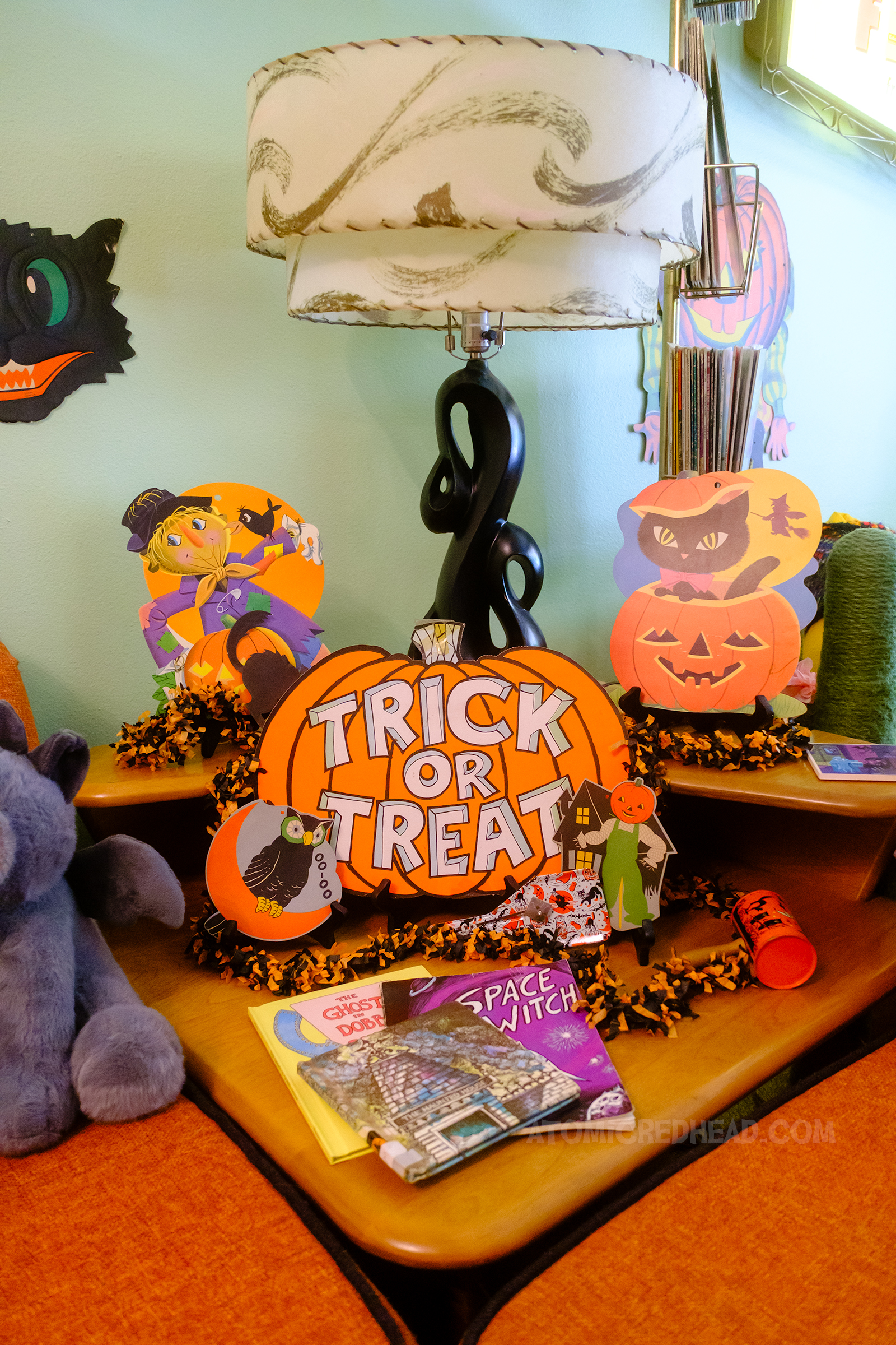Our corner table with various die cuts of jack o'lanterns, a scarecrow and owl.