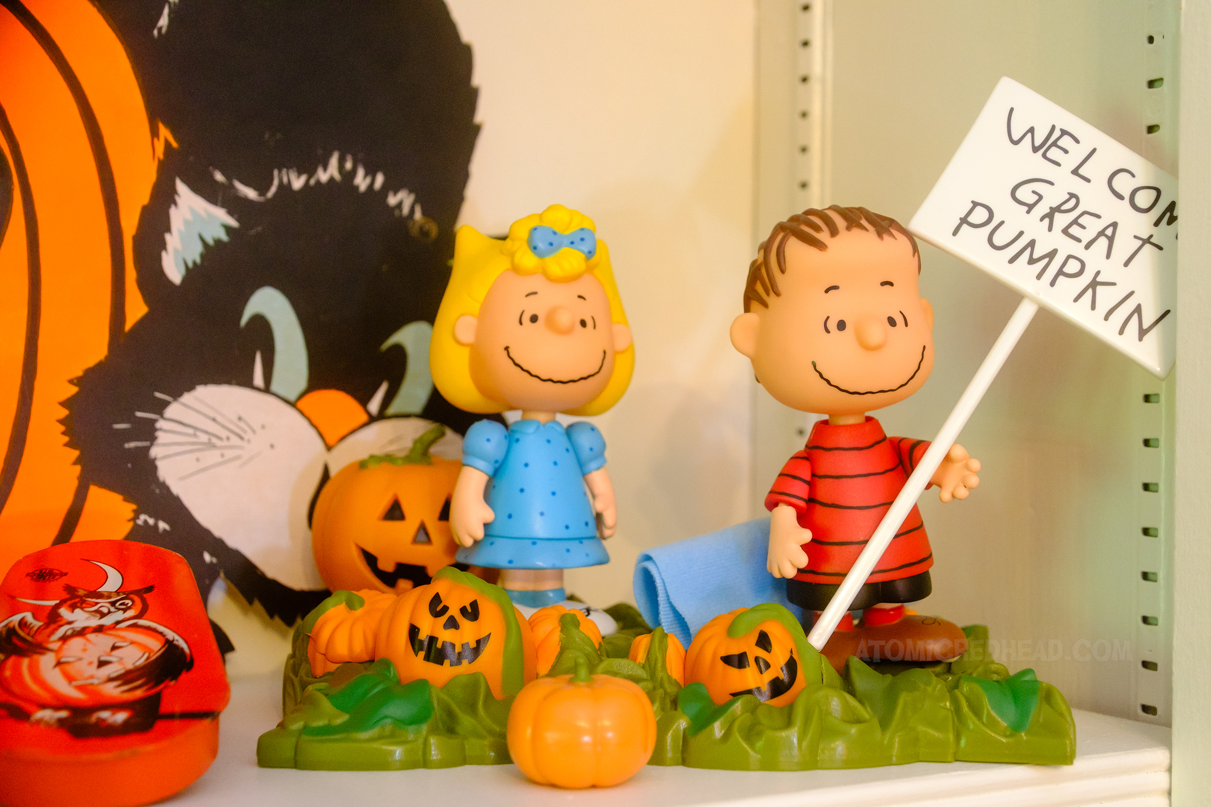 Action figures of Sally and Linus in a pumpkin patch.