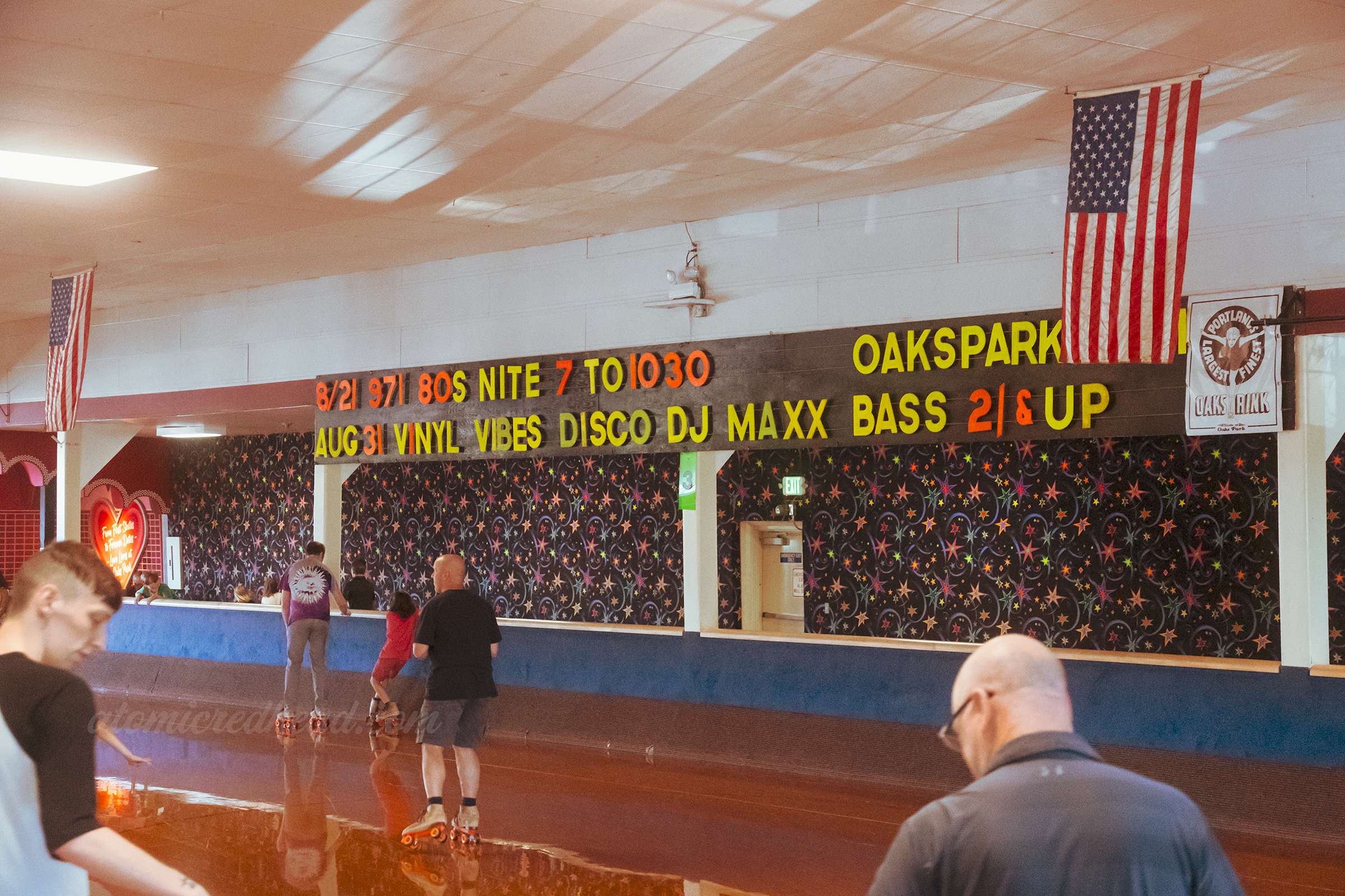 Neon letters hang above the roller ring letting you know dates of special events.