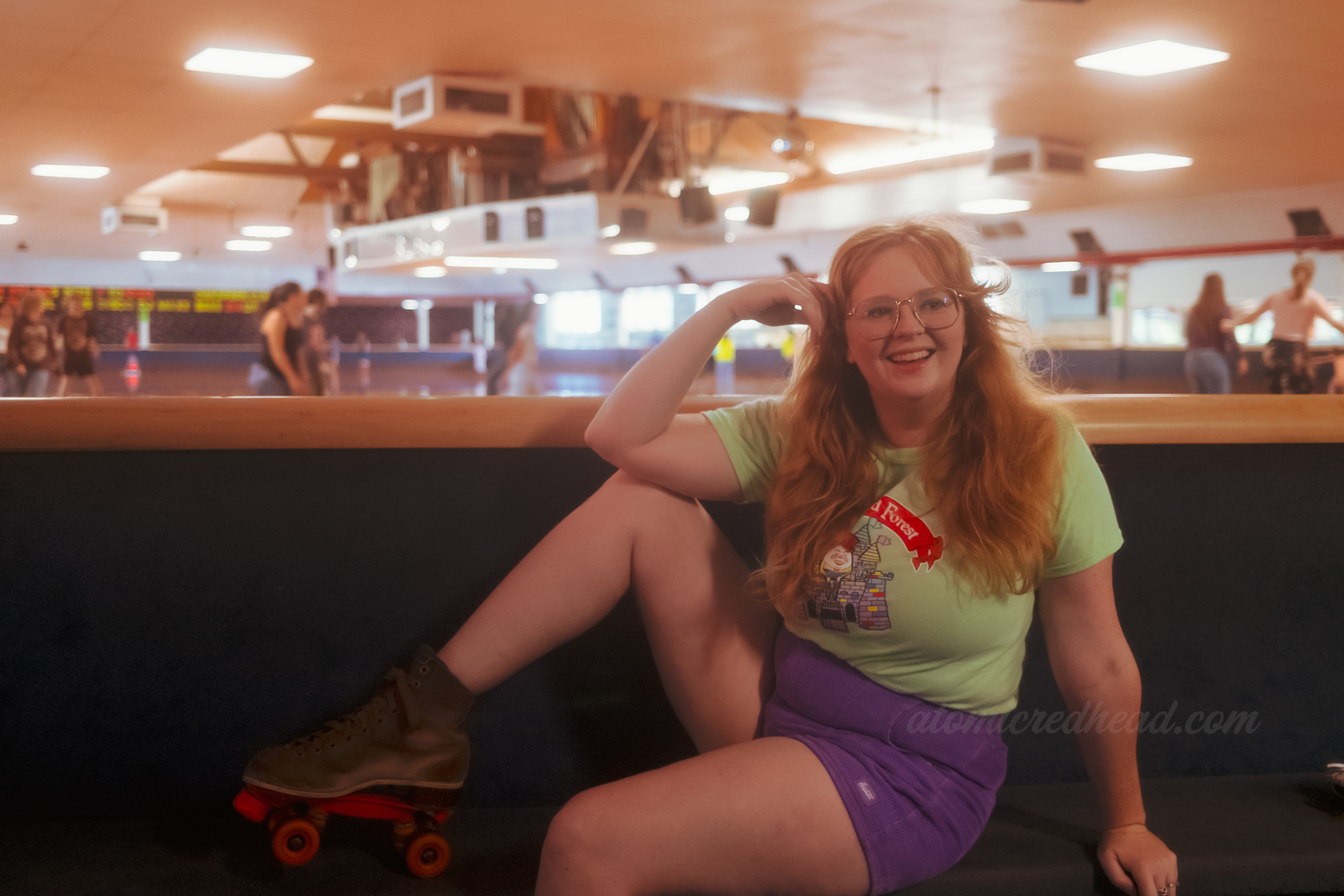 Myself seated on a bench just outside the roller rink above you can see the pipe organ that hangs above the rink.