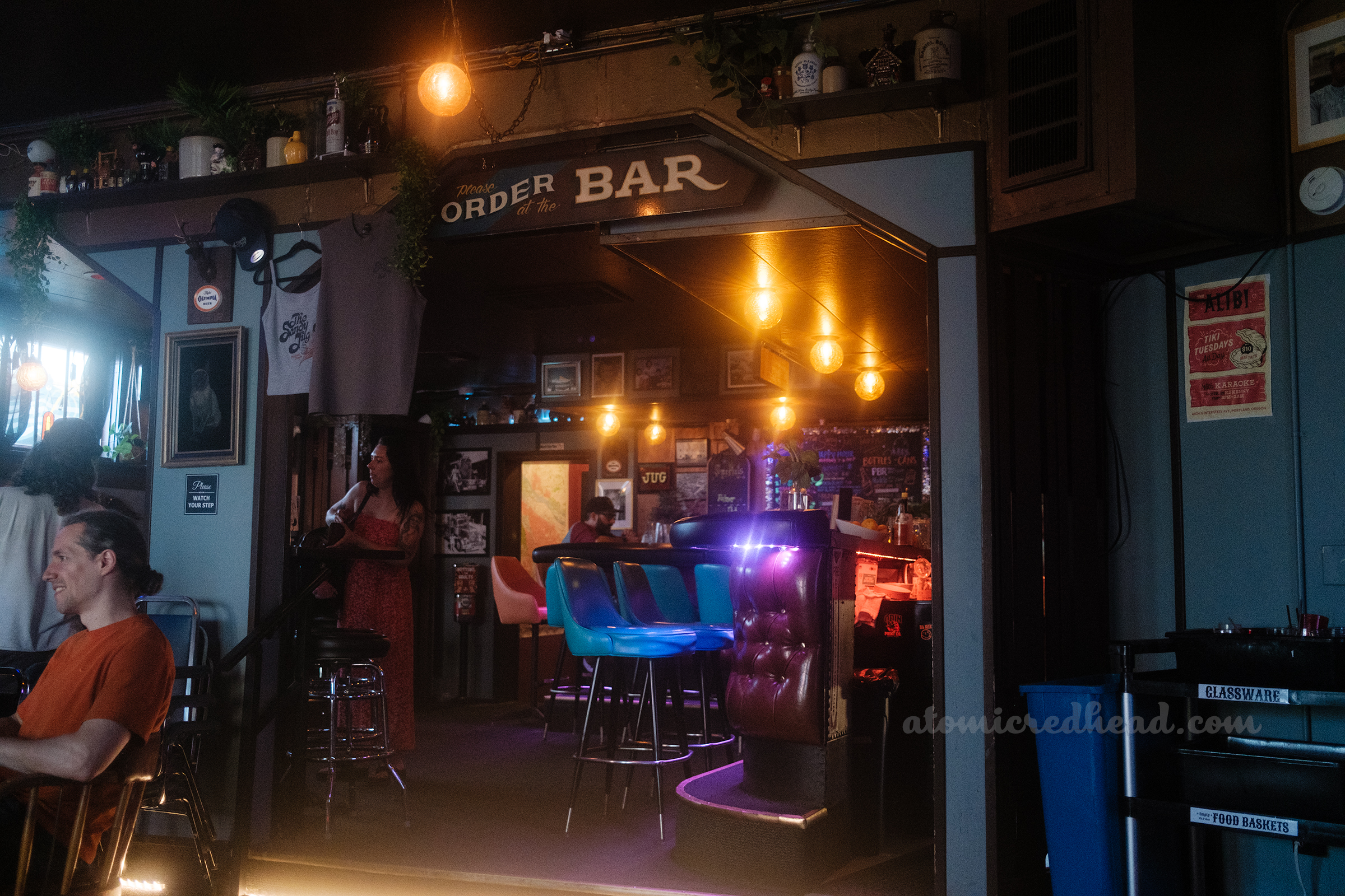 A hand painted sign reads "Order at Bar"