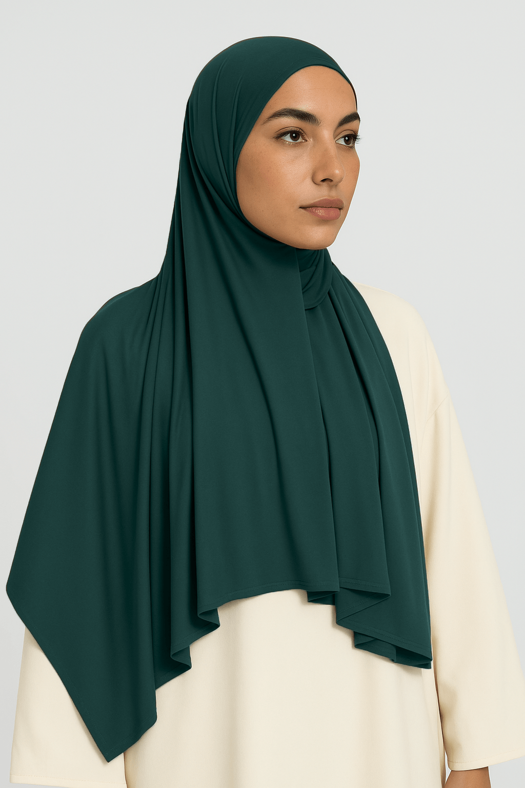 model wearing dark green modal jersey hijab