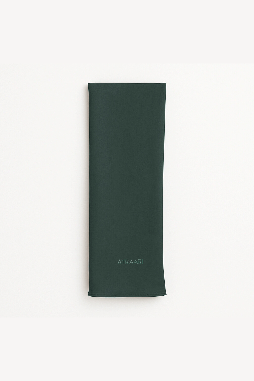 model wearing dark green modal jersey hijab