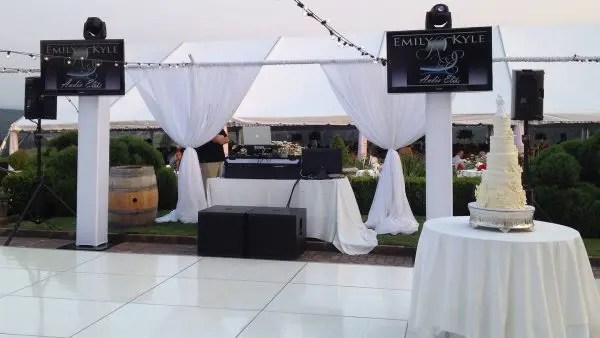 Elegant wedding DJ setup by Audio Elite with a personalized touch for Emily and Kyle's special day