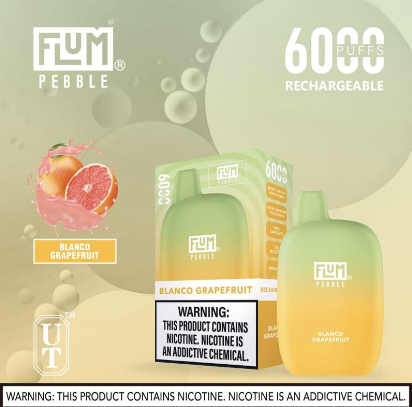 Gradient-green to orange vape package and two vape devices labeled Flum Pebble Blanco Grapefruit, with a grapefruit splash image and a nicotine warning on the box.