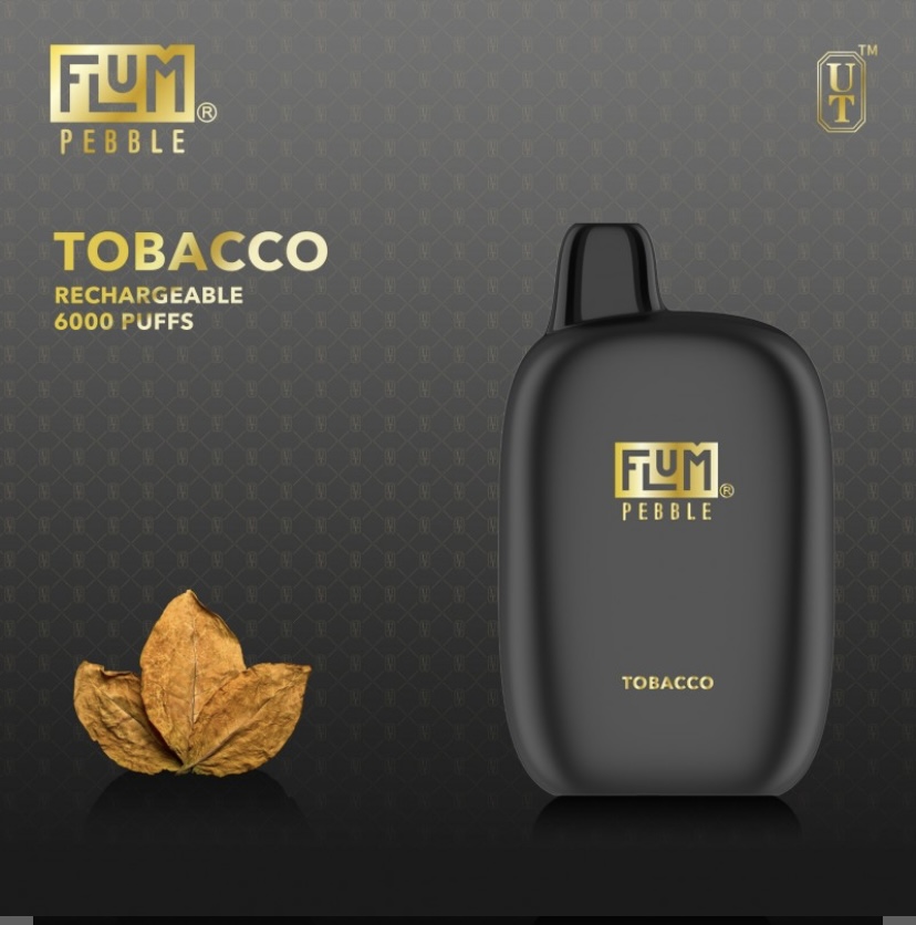 Black Refillable Vape Device with Flum Pebble Logo Beside a Dried Tobacco Leaf on a Dark Patterned Background - Australia E-cigarette Store