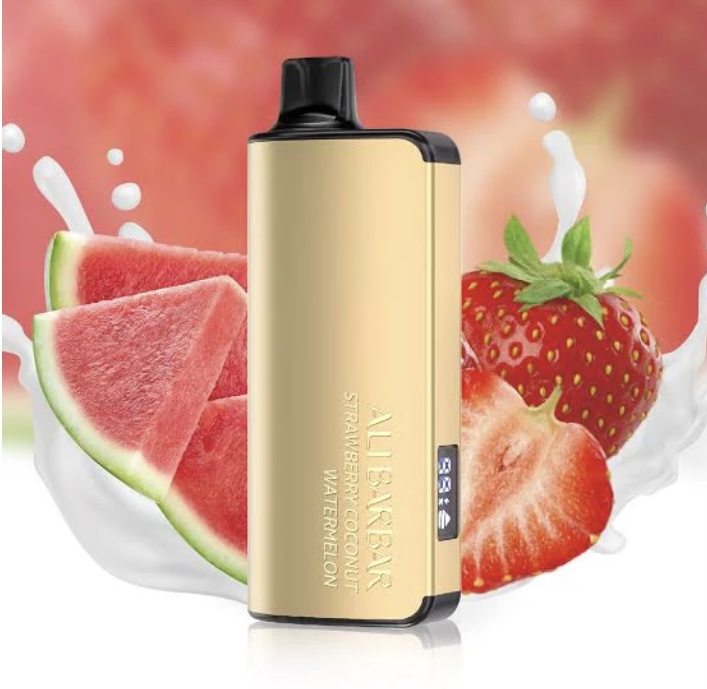 Gold Vape Device Standing Upright with Watermelon Slices and a Strawberry in the Background White Splash to Imply Fruity Flavor - Australia E-cigarette Store