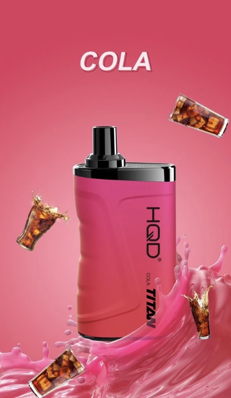 Pink background perfume bottle with black cap and bold 'HIDRO TITAN' label, surrounded by floating cola cubes and pink splash to convey a Cola scent.