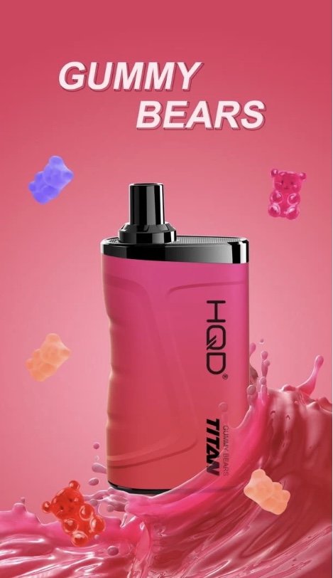 Pink vape juice bottle with a black cap, labeled 'GUMMY BEARS', surrounded by colorful gummy bears against a pink background.