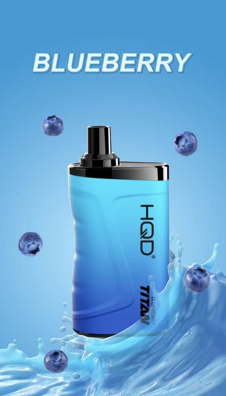Blueberry-scented fragrance bottle with blue liquid, surrounded by floating blueberries and a splash of water; the word BLUEBERRY appears above.