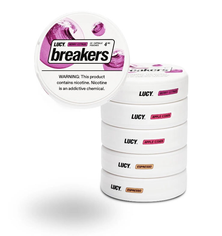 Round tin labeled Breakers by Lucy with a nicotine warning; stacked white tins show flavors Berry Citrus, Apple Cider, Espresso (assorted Lucy Breakers nicotine pouches).