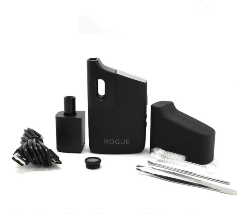 Rogue vape pod kit with charger, adapters, cleaning brushes, and small tool kit laid out on a white surface.