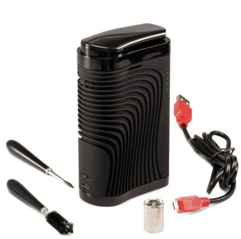 Black vertical portable power bank/charger with a USB cable and small included tools (screwdrivers, cleaning brush) on a white background.