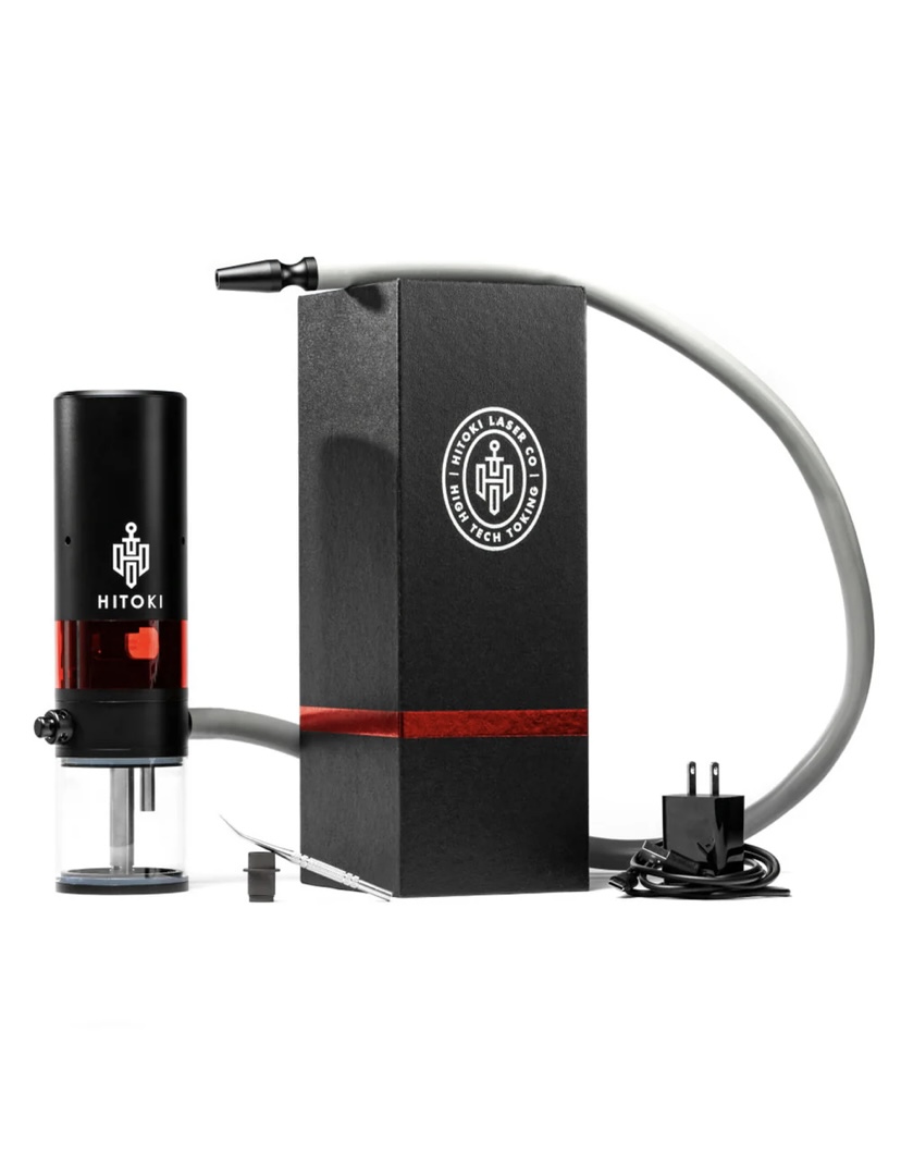 Hitoki Laser Cleaningengraving System Comprising a Black Rectangular Unit with a Laser Head on the Left Red Transparent Section and a Power Cord on the Right with the Hitoki Logo Visible on the Box and Components Nearby - Australia E-cigarette Store