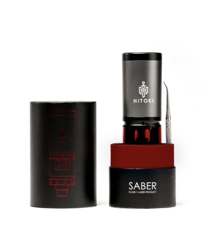 Hitoki Saber Laser Device with a Silver-gray Top and Red Base Standing Upright Next to Its Black Cylindrical Box on a White Background - Australia E-cigarette Store