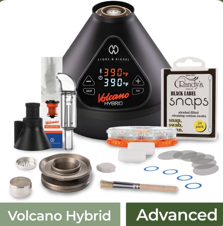 Volcano Hybrid Vaporizer with Accessory Bundle Bags Mouthpieces Screens O-rings Cleaning Swabs and Tools Laid out Around the Unit Nearby a Box of Randys Black Label Snaps - Australia E-cigarette Store