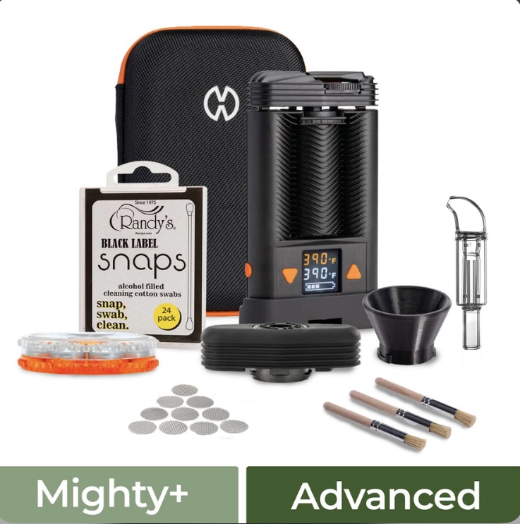 Mighty+ Advanced vaporizer cleaning kit with case, cleaning wand, swabs, brushes, and accessories laid out for use.