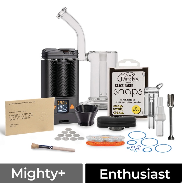 Vaporizer kit with glass attachment, cleaning swabs, O-rings, and accessories on a white background.