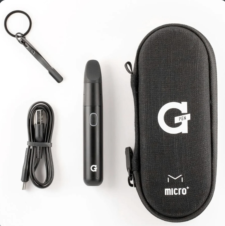 Vape pen kit with USB charger, mouthpiece, and black carrying case labeled 'G Pen micro+' on a white background.