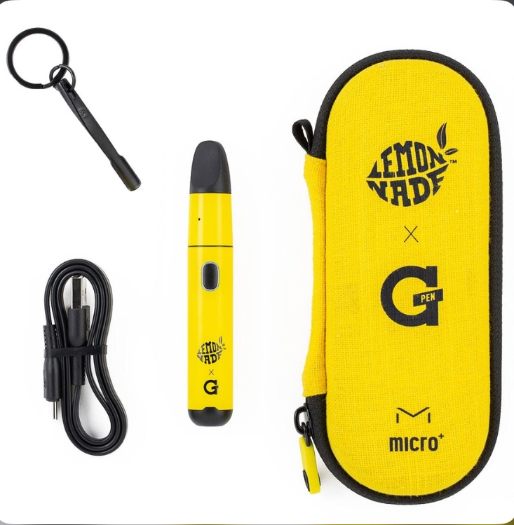 Yellow pen-style vape device with black ends, accompanied by a USB charging cable, a small cleaning tool, and a bright yellow protective case/ pouch labeled 'G Pen' and 'micro+'
