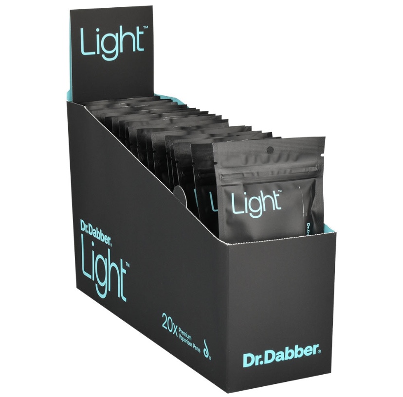 Display stand with multiple Dr. Dabber Light premium vaporizer pen packages in a black tray with teal 'Light' branding out front.