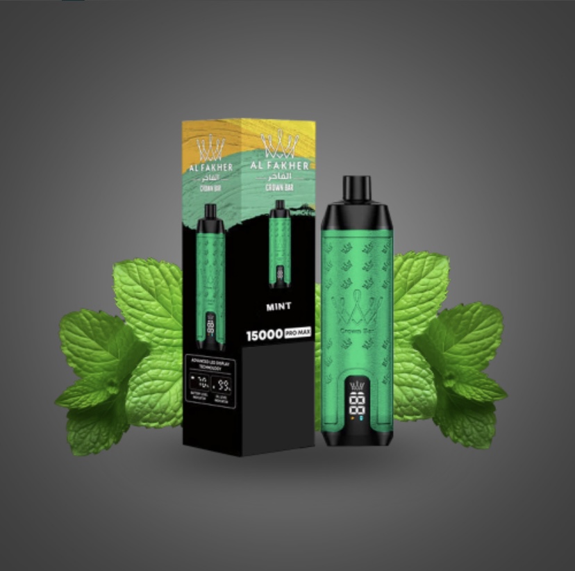 Al Fakher Mint Vape Pen Beside Its Black-and-green Box with Fresh Mint Leaves in the Background - Australia E-cigarette Store