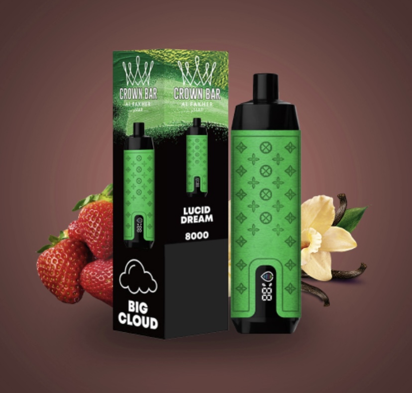 Disposable Vape Device with a Green Patterned Body and Black Mouthpiece Beside Its Packaging Set Against a Background of Strawberries and Vanilla Flowers - Australia E-cigarette Store