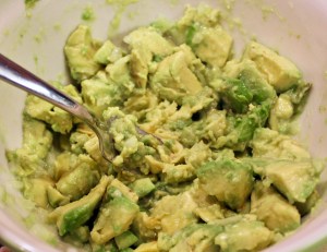 smashing avocado