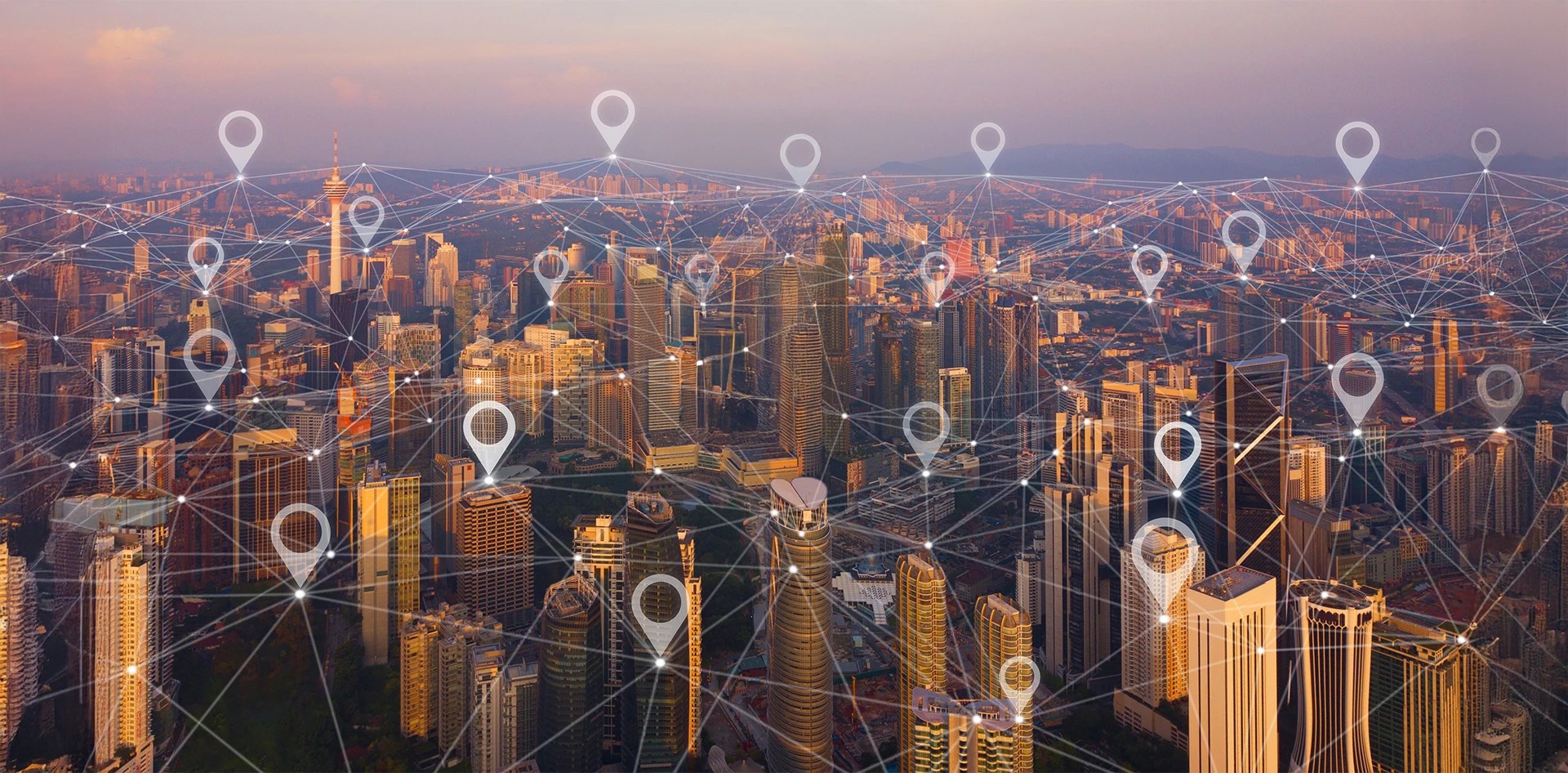 A cityscape with digital location markers and interconnected nodes illustrating hyperlocal environmental monitoring, showing why insurers should invest in hyperlocal air quality intelligence.