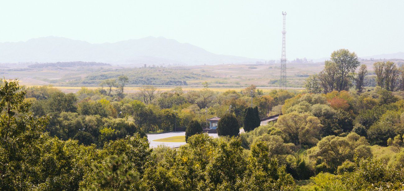 North Korea propaganda village with giant flagpole