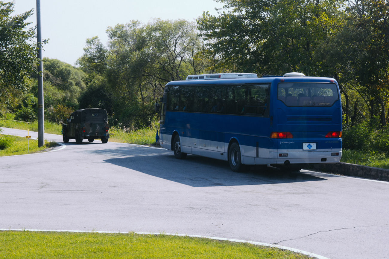 Our DMZ bus and military escort