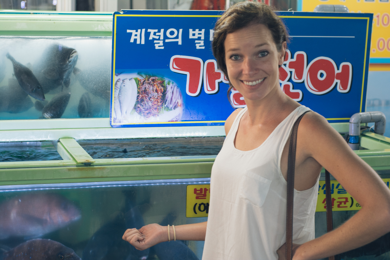 Kiana inspecting the seafood