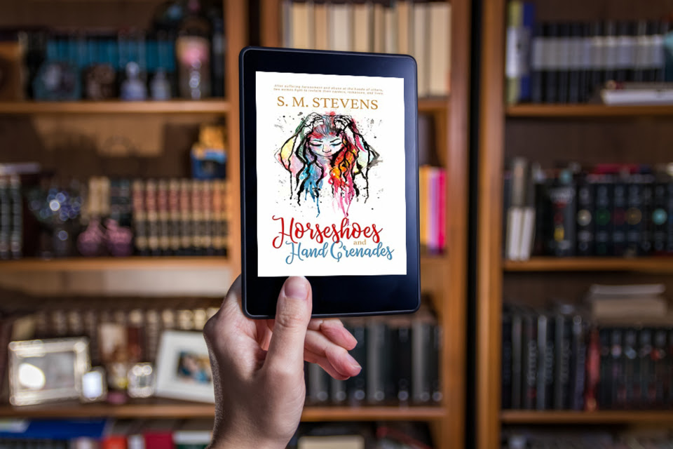 book on tablet hand background of books library