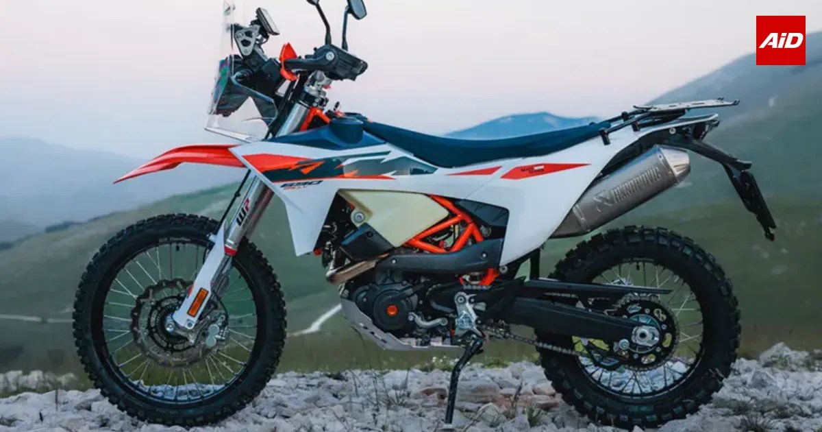 2027 KTM 690 Rally adventure motorcycle shown in a rugged mountain landscape with its off-road design and rally-ready equipment
