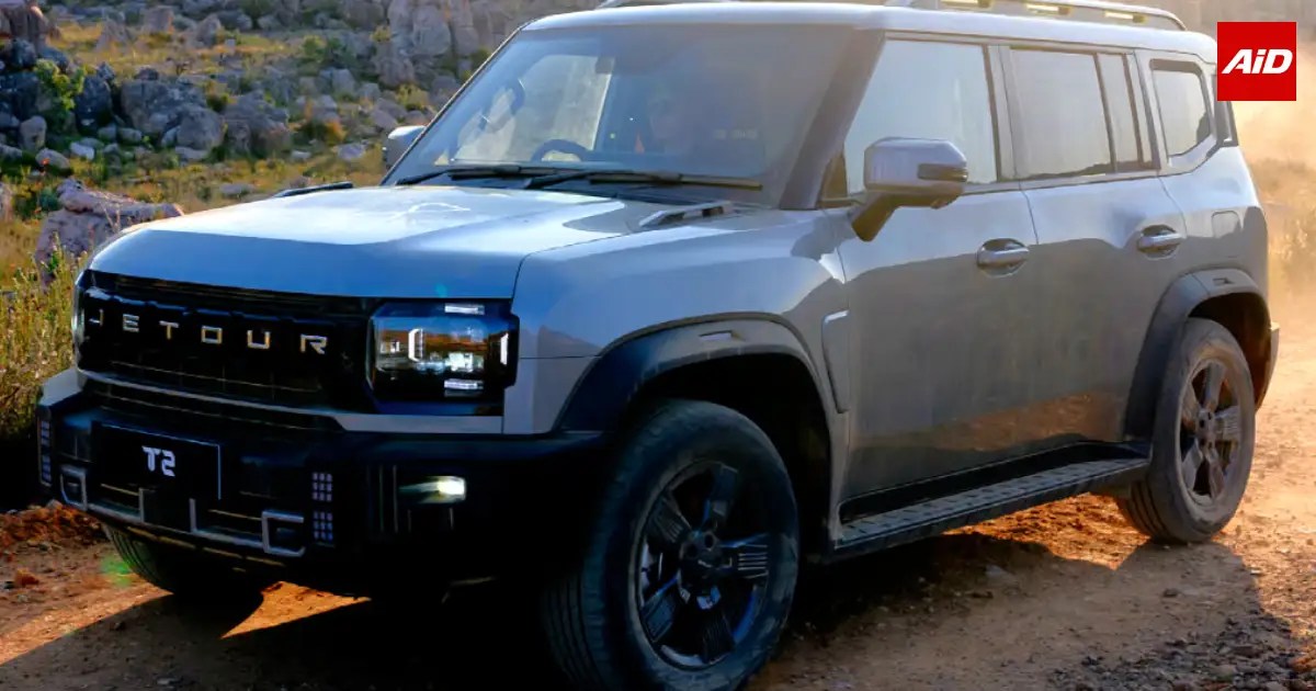 JSW Combat SUV shown in a rugged outdoor setting with boxy styling and prominent front grille