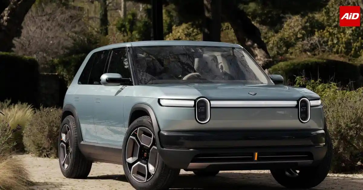 Rivian R3 electric SUV front three-quarter view showcasing its futuristic design and rugged styling