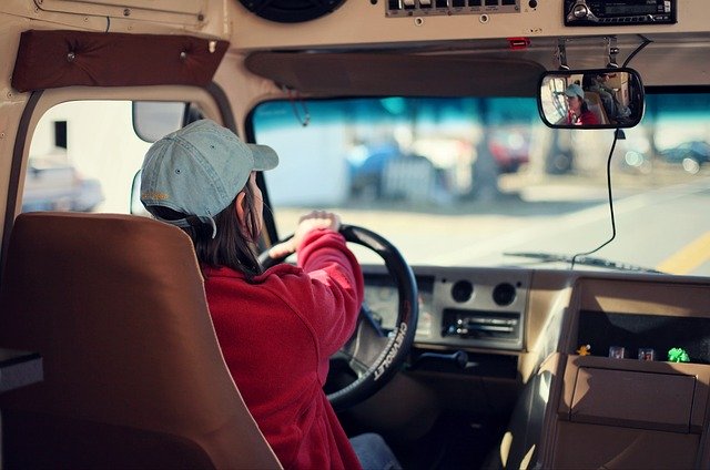 Bus Driver turning steering wheel
