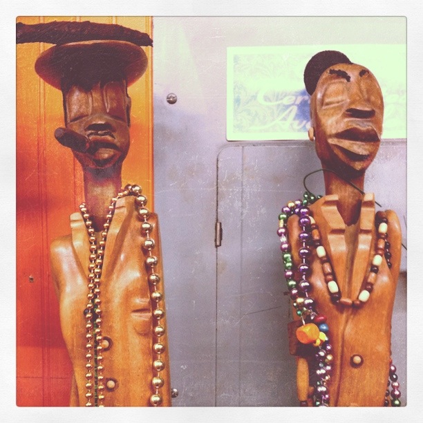 Statuettes in a French Quarter cigar shop