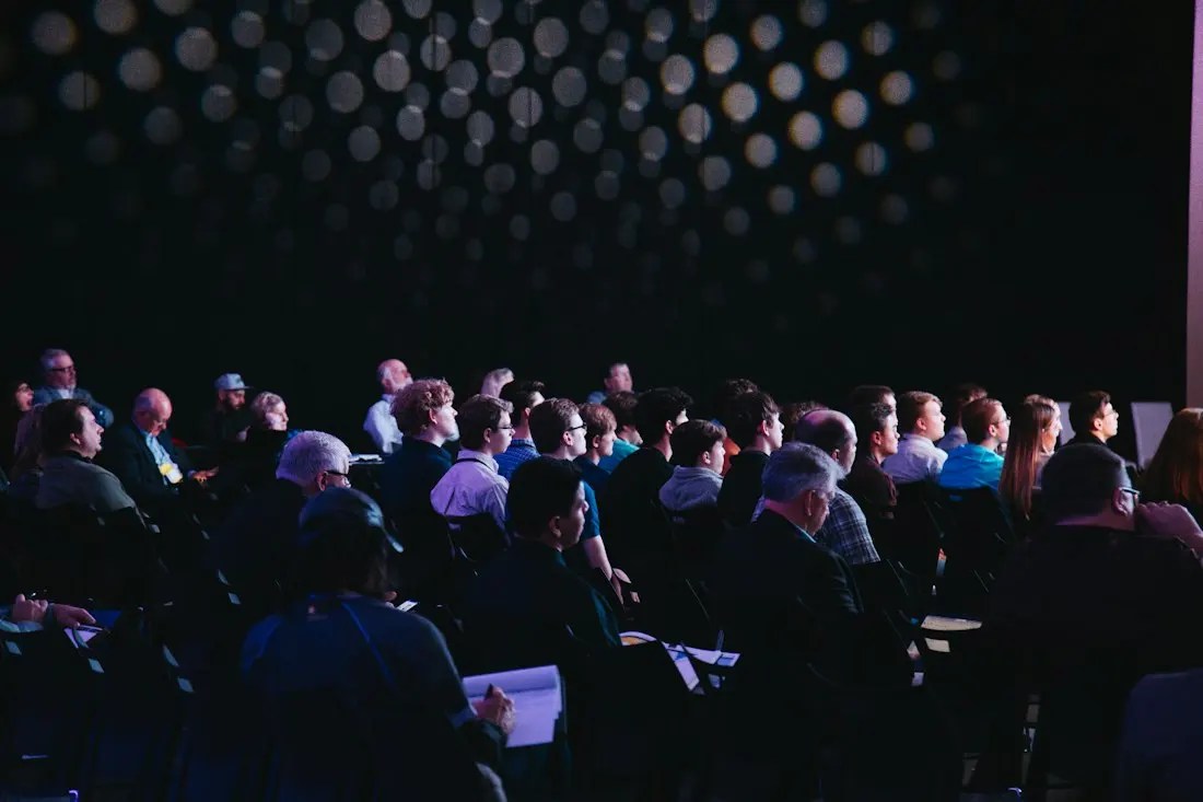 Attendees listening during a professional conference