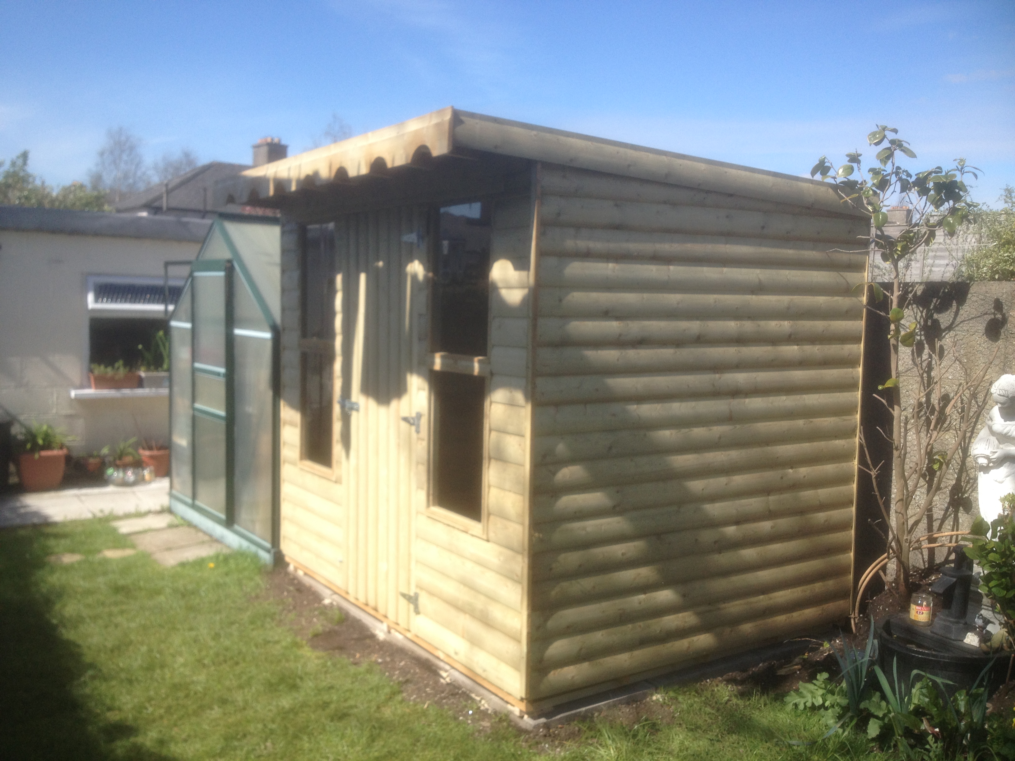 8ft x 6ft Pent roof barrel board shed with double oblong windows