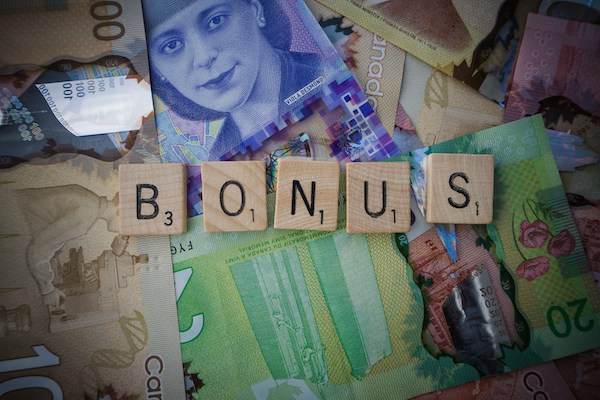 The word bonus spelled out with scrabble pieces