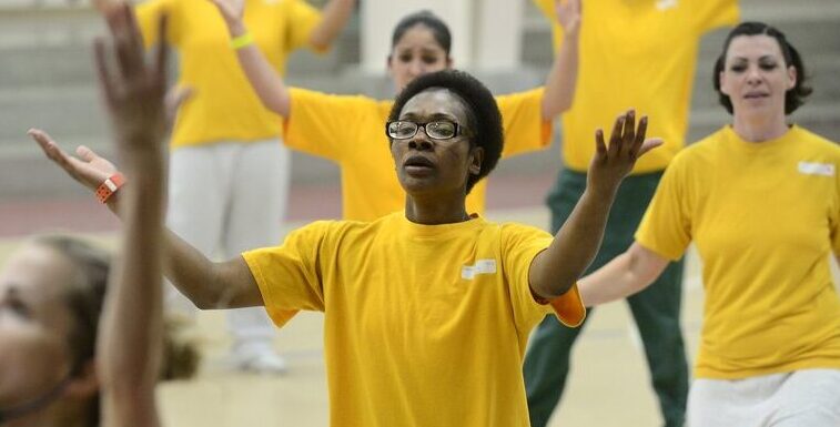 Women dancing in prison
