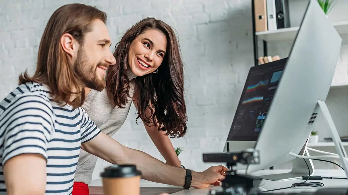 People using laptops and mobile devices with illustrated icons representing key web technologies