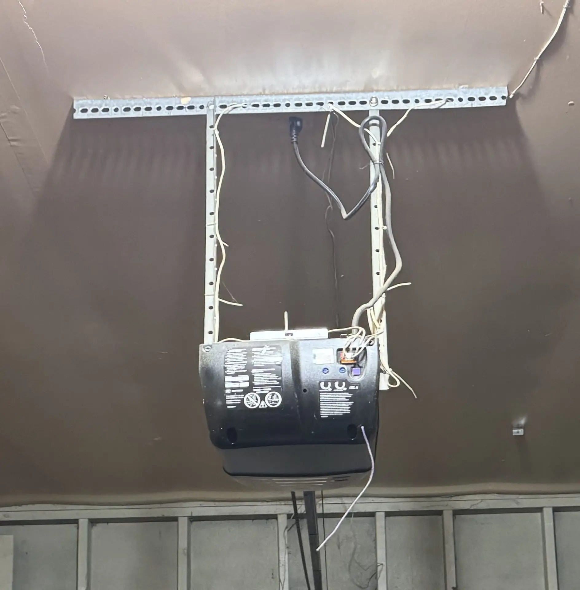 Garage door opener not responding remote or wall switch repair in Hamilton Ontario