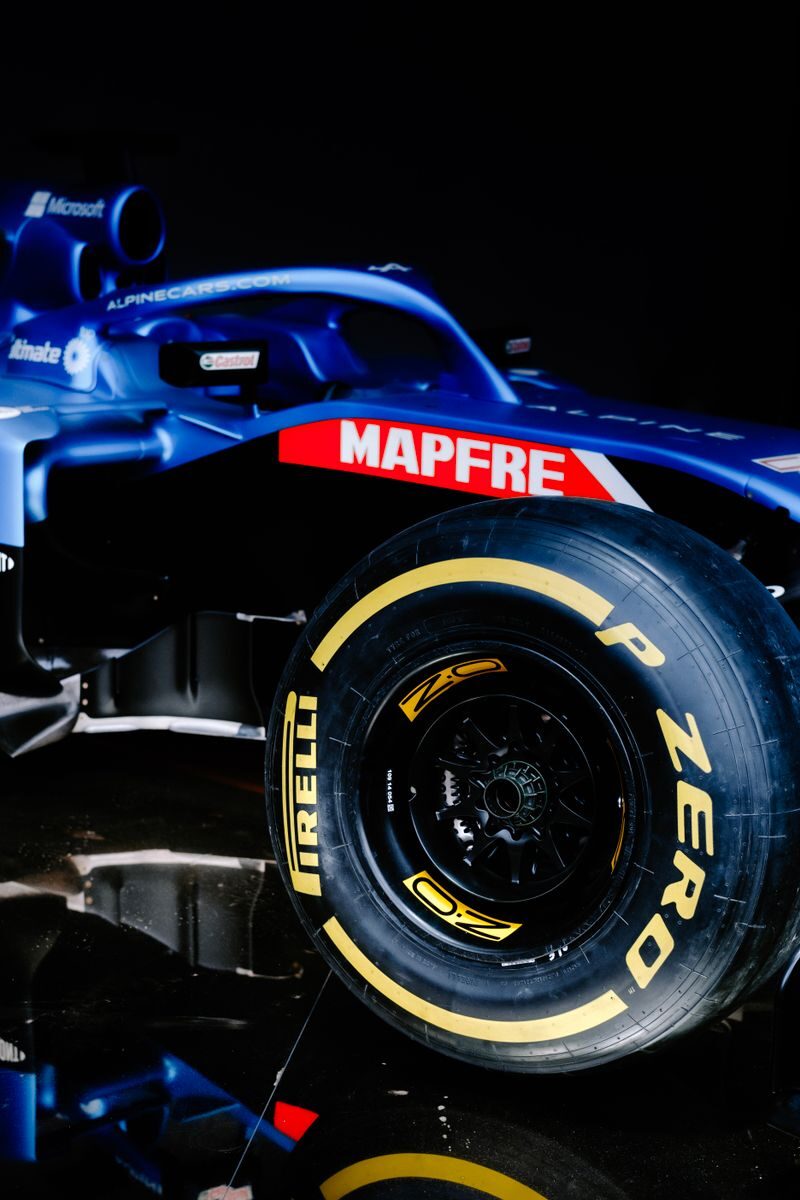 Close-up of a Formula 1 front wheel, tyre and brake assembly on a race car