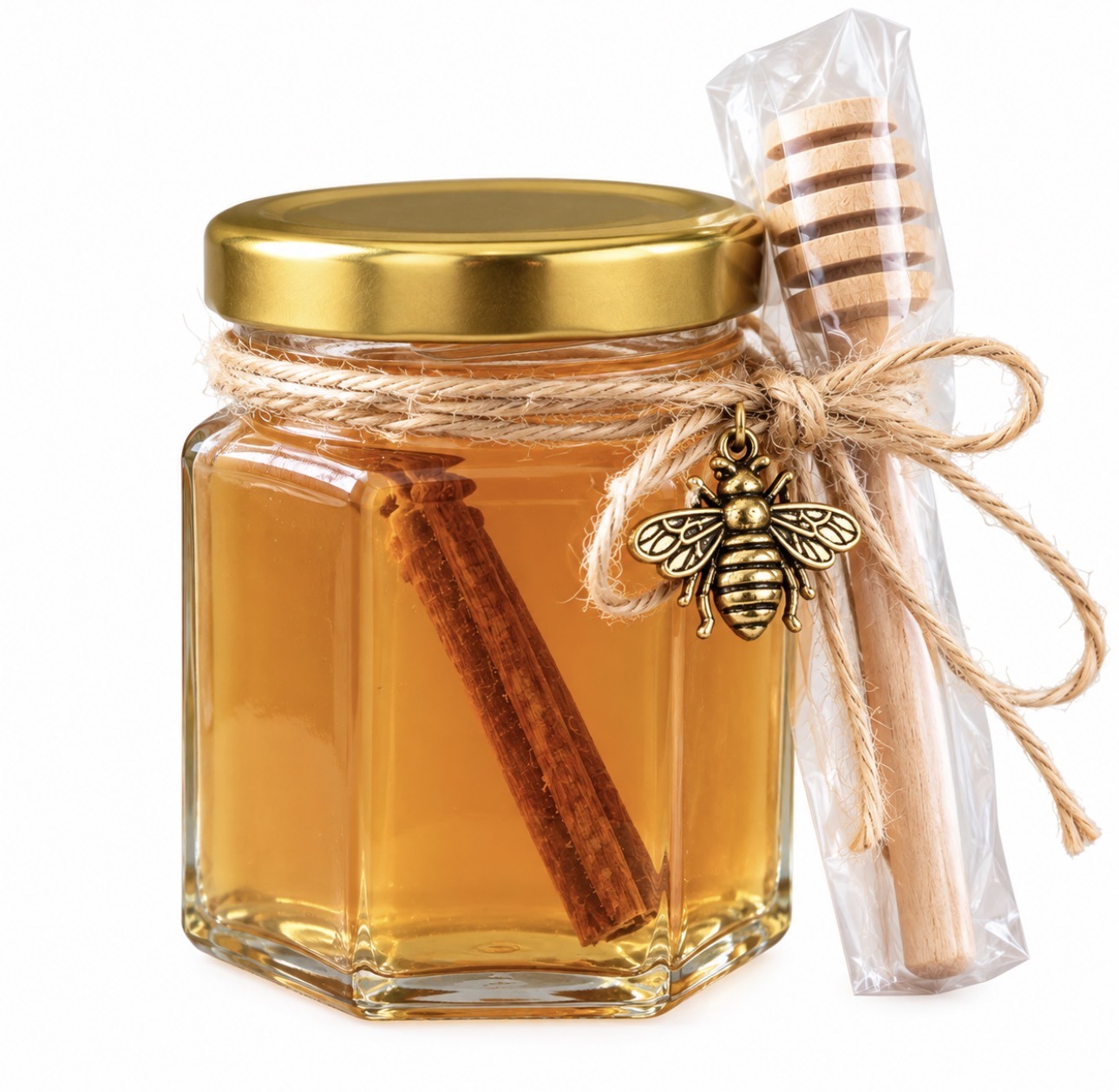 Winter’s Gold Christmas Spiced Herbal Honey in a glass jar with cinnamon stick and wooden honey dipper