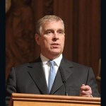 Andrew Mountbatten-Windsor speaking at a podium.