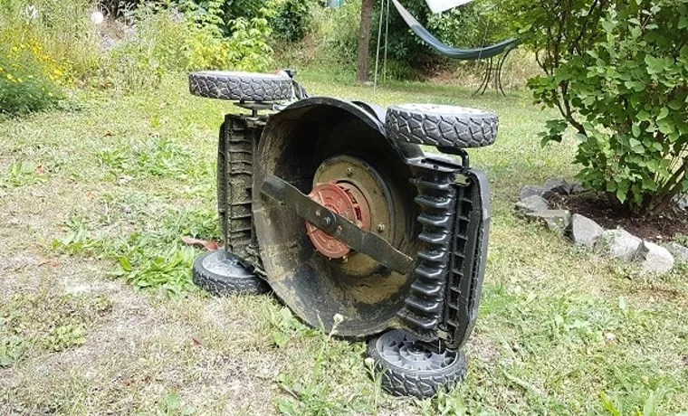 which way to tilt a lawn mower